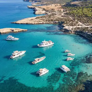 Guests swimming in the Blue Lagoon on the Project Cyprus Tours boat trip